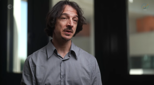 A man in grey shirt